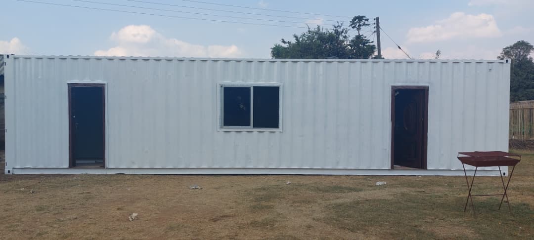 Converted steel shipping container