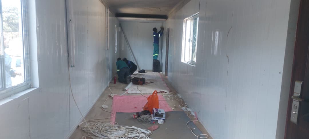 Shipping container interior fit-out in progress