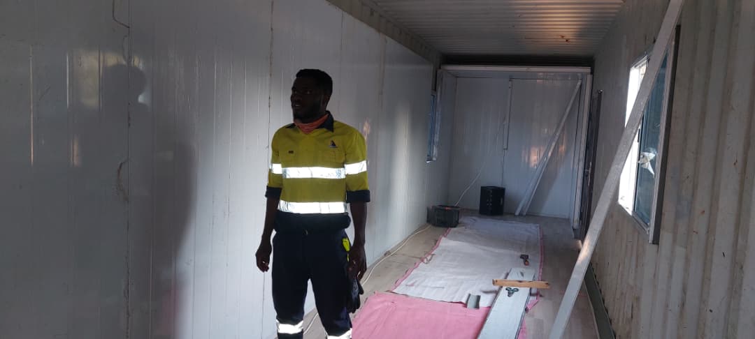 Insulated interior of a converted shipping container